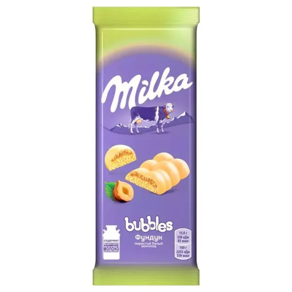 Milka Ciocolata Bubbles 83g albă aerată cu nuci întregi - image 1