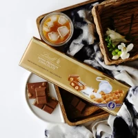 Шоколад молочный Lindt Milk Hazelnut Gold с фундуком 300 г - thumbs image 2